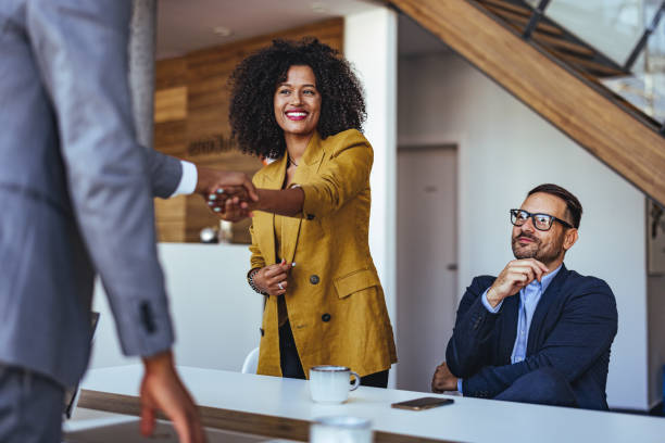 Handshake symbolising trusted partnership with Homegrown Brokers